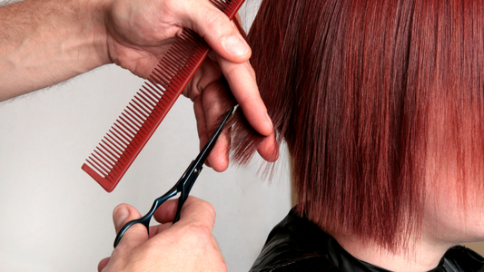 hair being cut with scissors