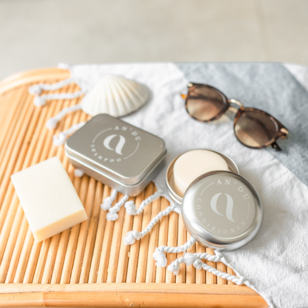 Shampoo and conditioner tins on holiday