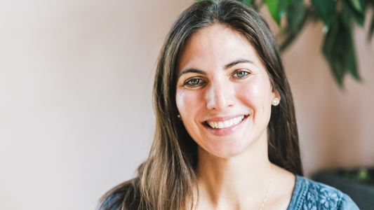 Woman in her 30s reflecting on hair changes and scalp health