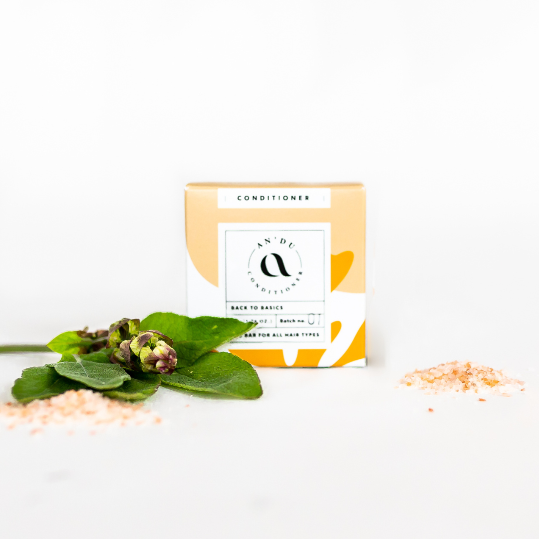 Conditioner bar in its packaging with sea salt and sage